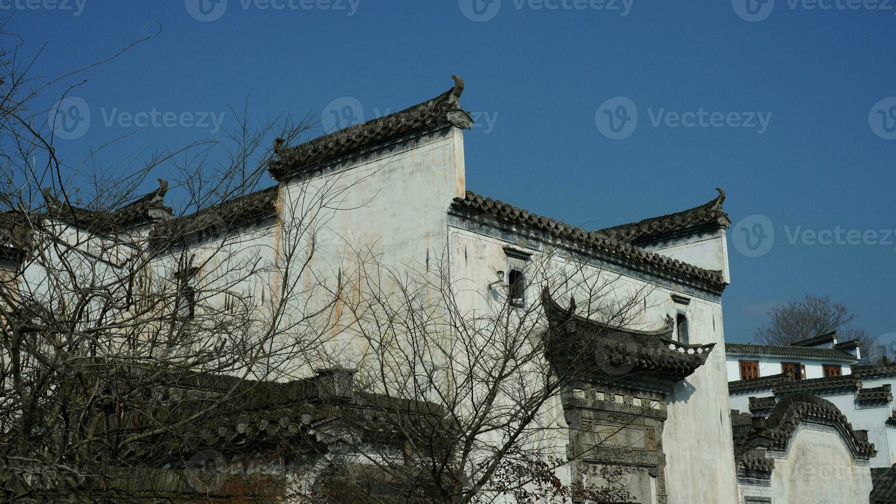 The beautiful traditional Chinese village view with the classical architecture and narrow lane  as background photo