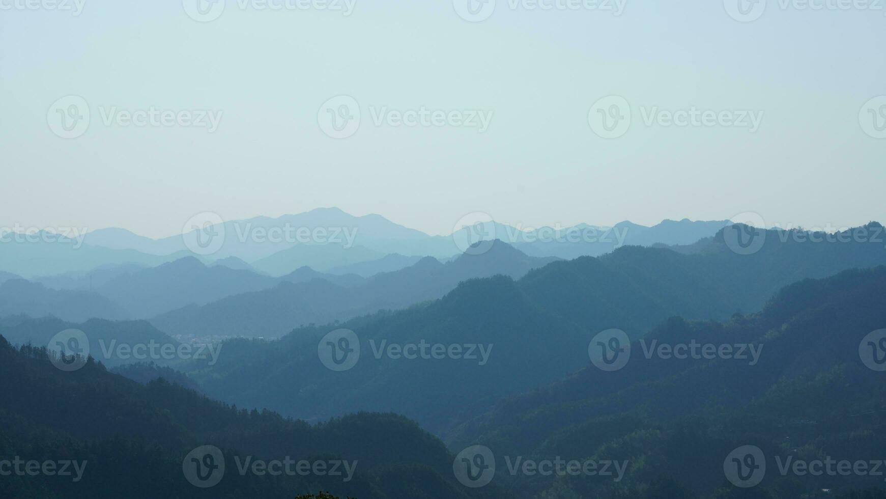 The beautiful mountains view from the top of the hill in spring photo