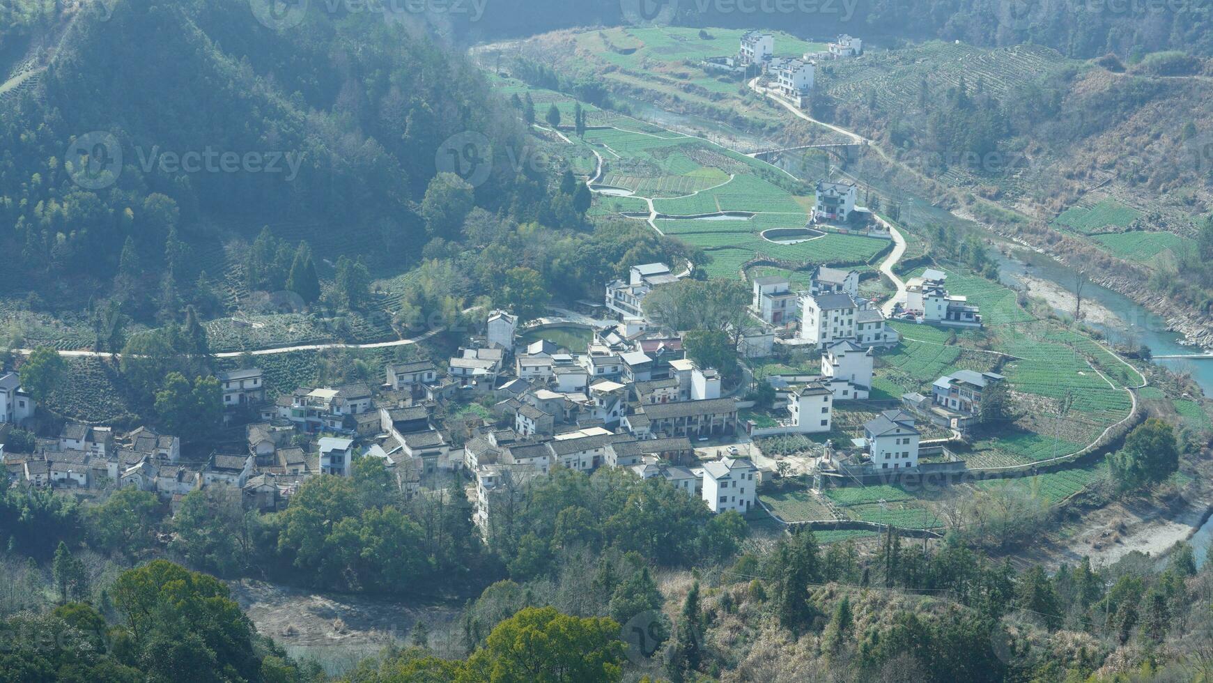 The mountains and valley view with the river running through them in spring photo