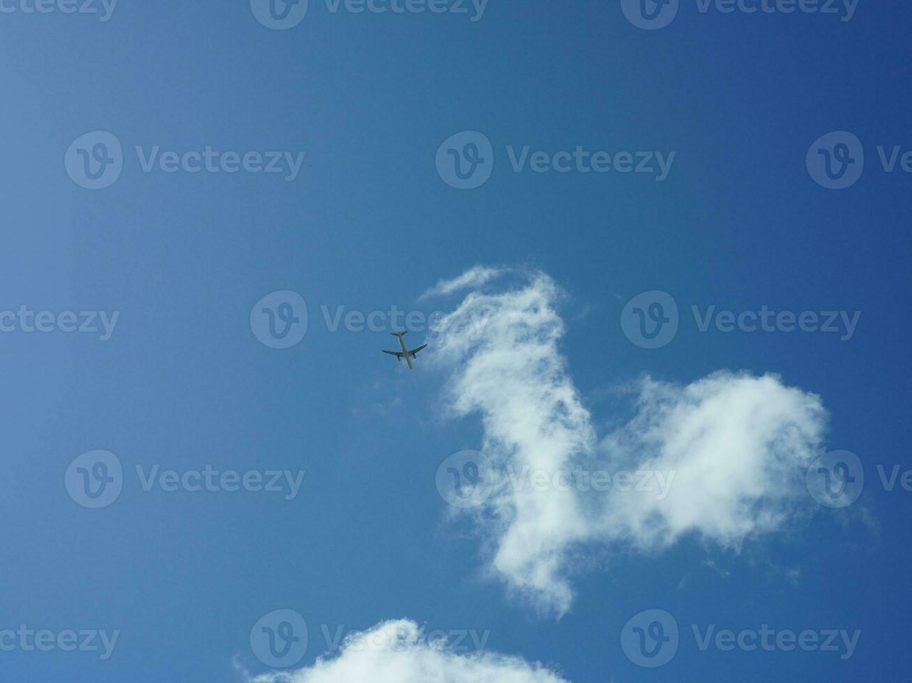 The beautiful sky view with the white clouds and blue sky as background in summer photo