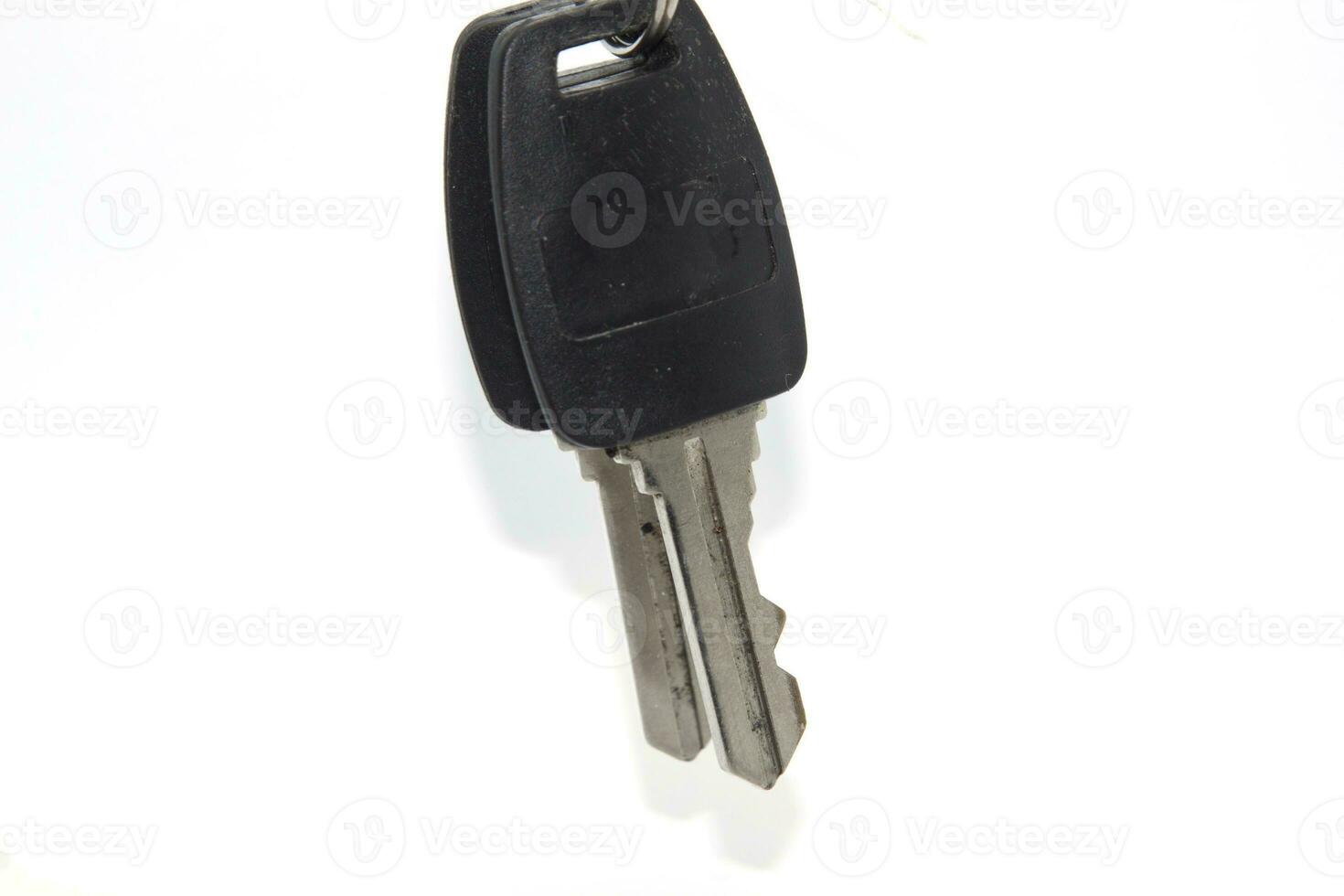 House keys, furniture keys for locking to protect your property from thieves and spying on theft of your property is a level of safety and protection on a white background. photo