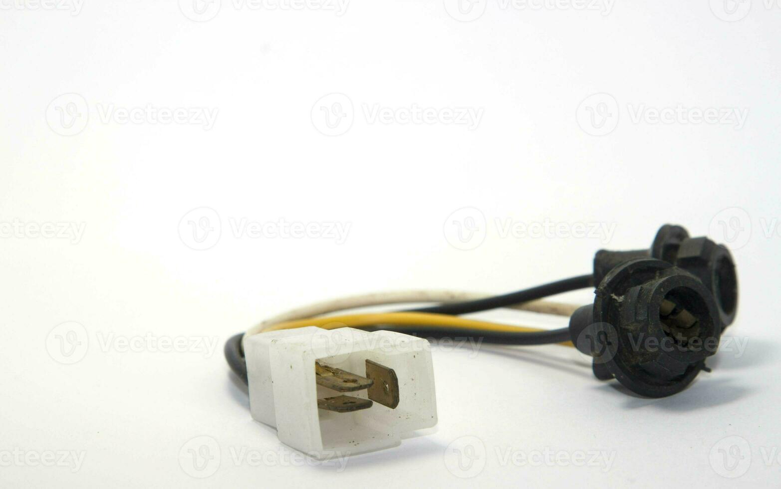 plug-in is a vehicle's turn signal system that is an essential device for traveling to provide a left or right turn signal on a white background as a traffic signal. photo