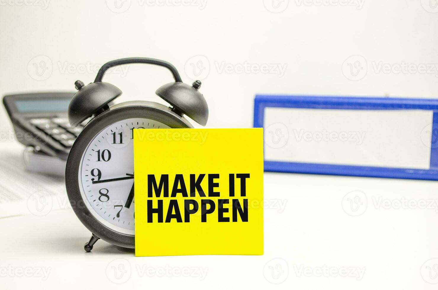 Retro alarm clock and the text make it happen word photo