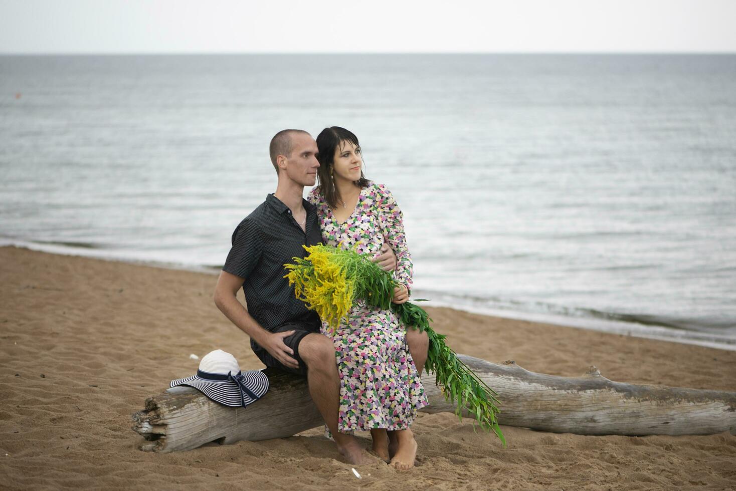 Romantic young couple in love on the beach photo