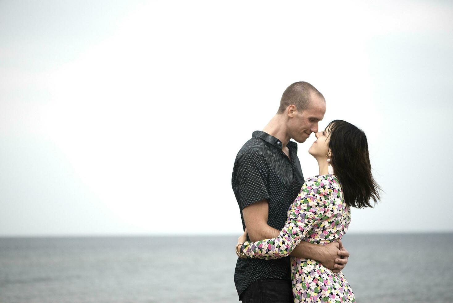 Romantic young couple in love on the beach photo