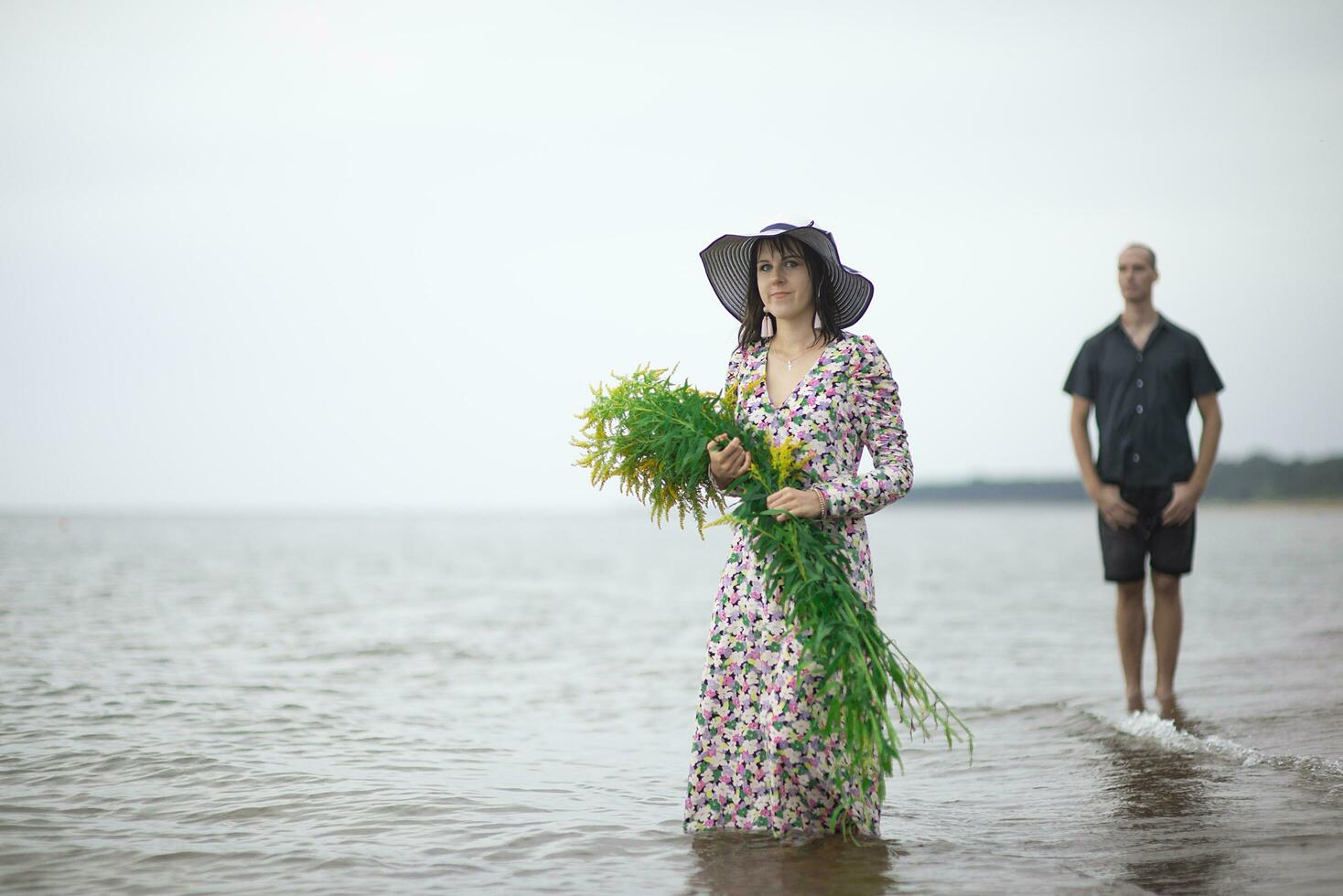 Romantic young couple in love on the beach photo