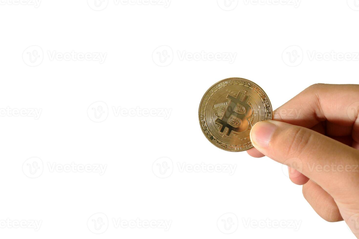 Close up of hand holding bitcoin isolated on white background. Cryptocurrency trading concept photo