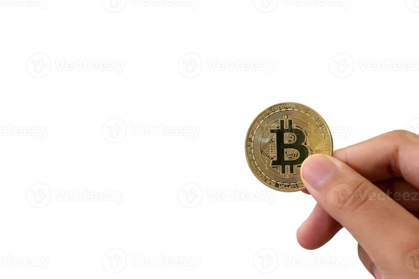 Close up of hand holding bitcoin isolated on white background. Cryptocurrency trading concept photo