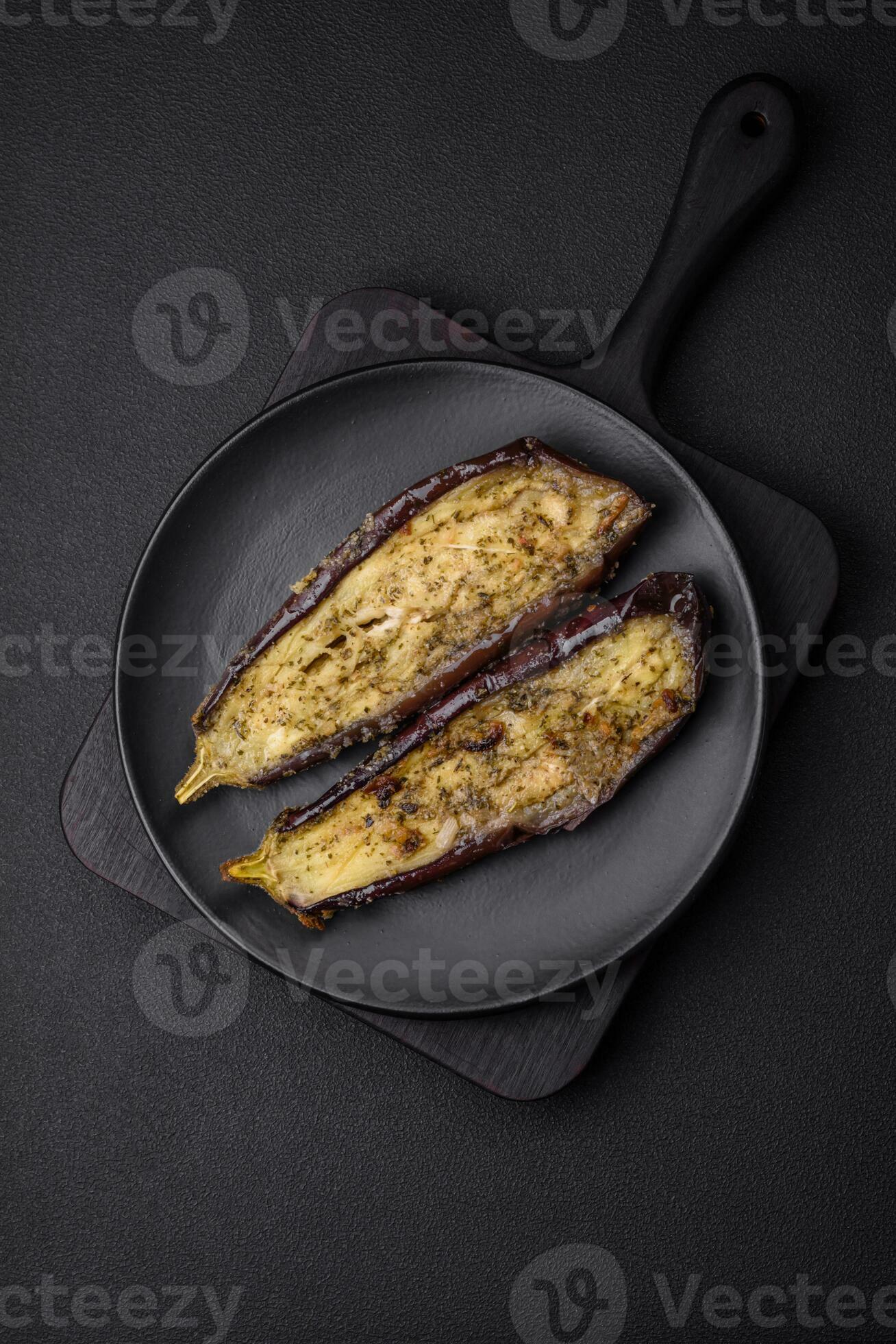 Delicious eggplant cut into two halves baked with salt, spices and