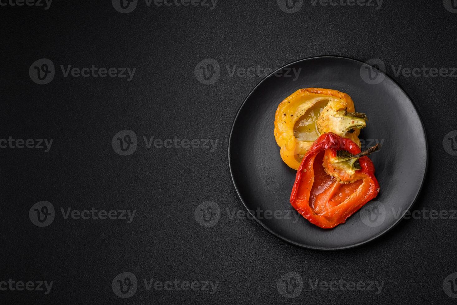 Delicious juicy grilled peppers with spices and herbs photo