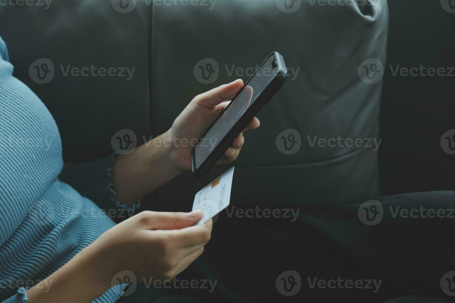 Close up of woman hand using credit card and laptop for payment and online shopping, Online shopping, payments digital banking, E-commerce concept. photo