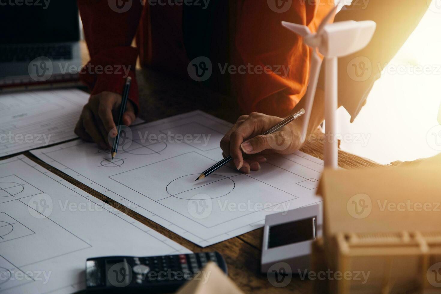 Professional Mechanical Engineer team Working on Personal Computer at Metal lathe industrial manufacturing factory. Engineer Operating lathe Machinery. Product quality Inspection photo