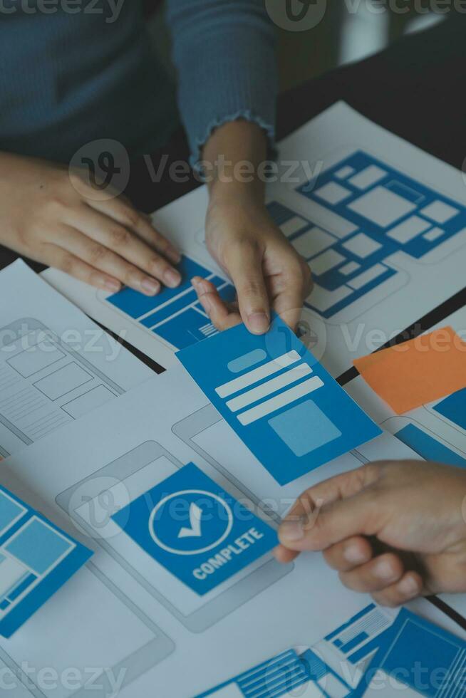 ux Graphic designer creative sketch planning application process development prototype wireframe for web mobile phone . User experience concept. photo