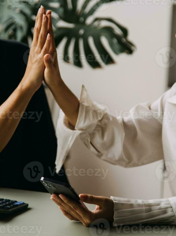 Financial Business team present. Business man hands hold documents with financial statistic stock photo, discussion, and analysis report data the charts and graphs. Finance Financial concept photo