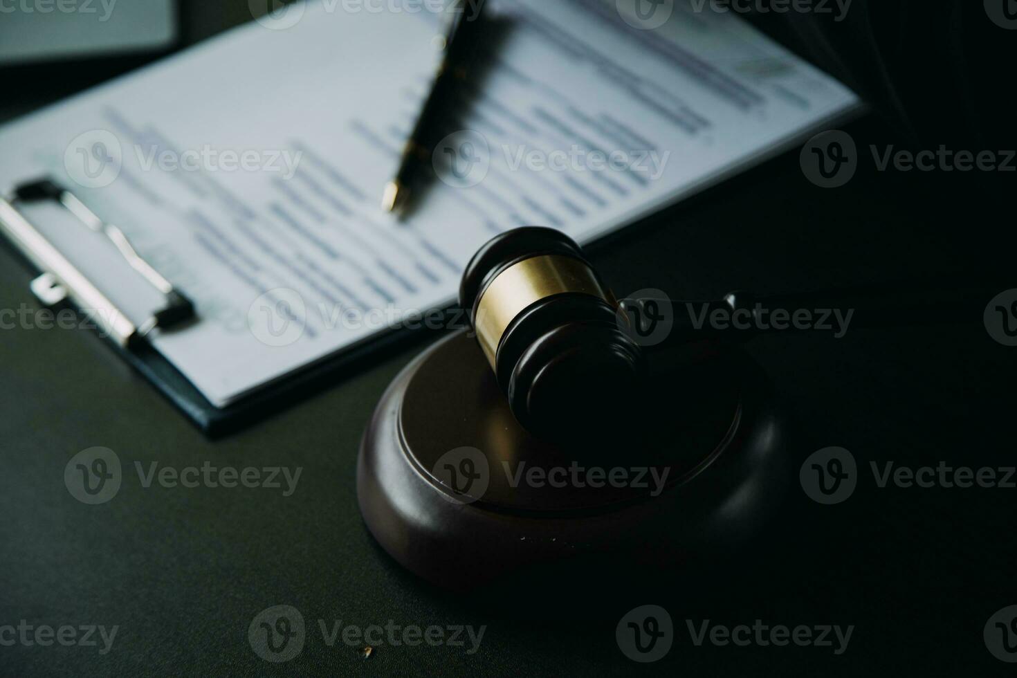 Business and lawyers discussing contract papers with brass scale on desk in office. Law, legal services, advice, justice and law concept picture with film grain effect photo