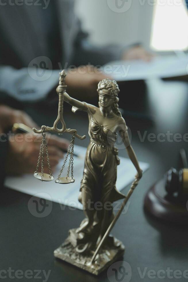 Businessman and Male lawyer or judge consult having team meeting with client, Law and Legal services concept. photo
