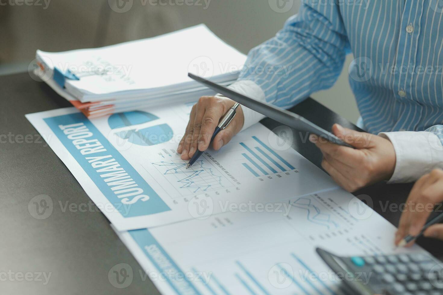 Brainstorming Collaboration and successful partnership analysis by Young business Asian people working in an office workspace photo
