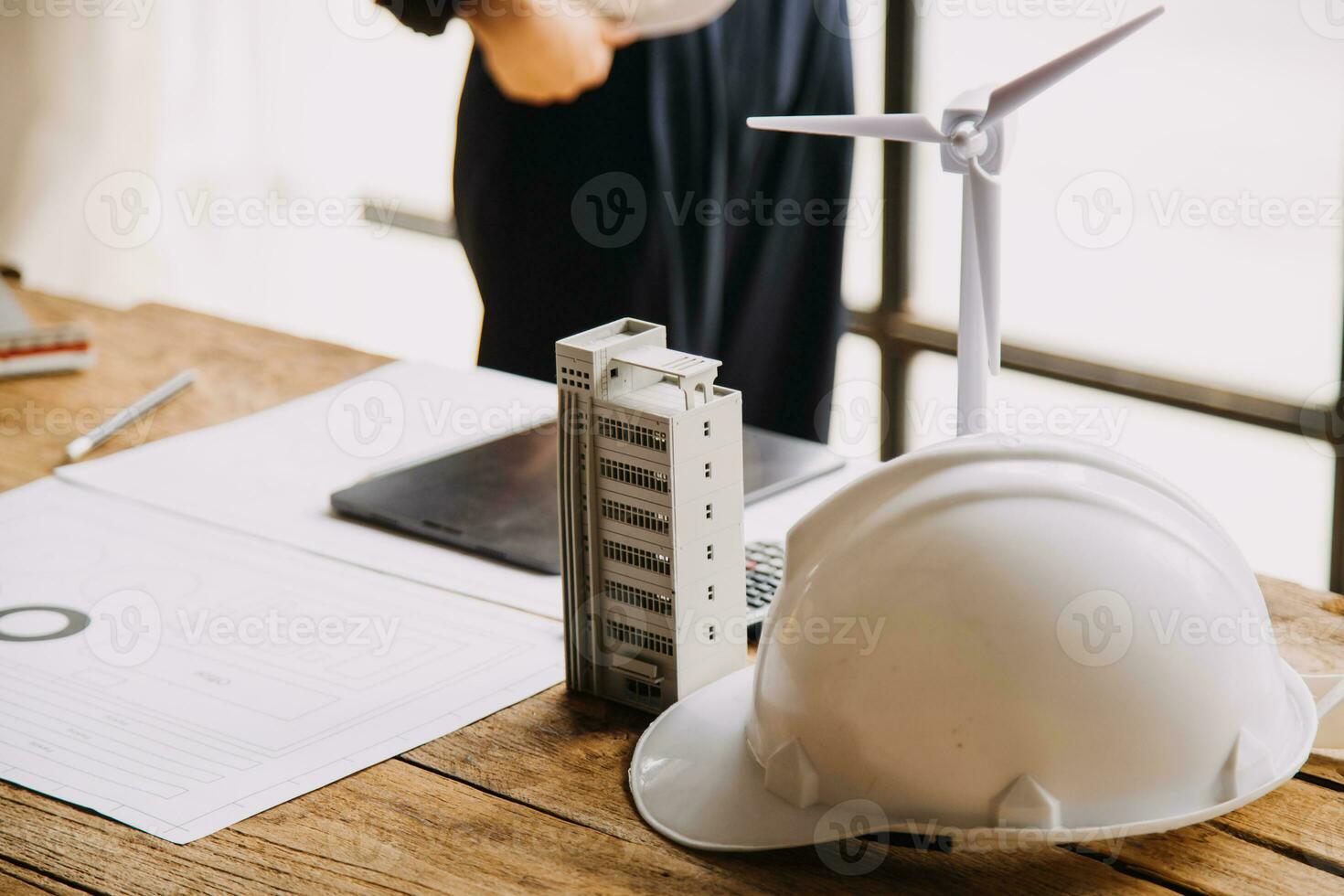 Professional Mechanical Engineer team Working on Personal Computer at Metal lathe industrial manufacturing factory. Engineer Operating lathe Machinery. Product quality Inspection photo