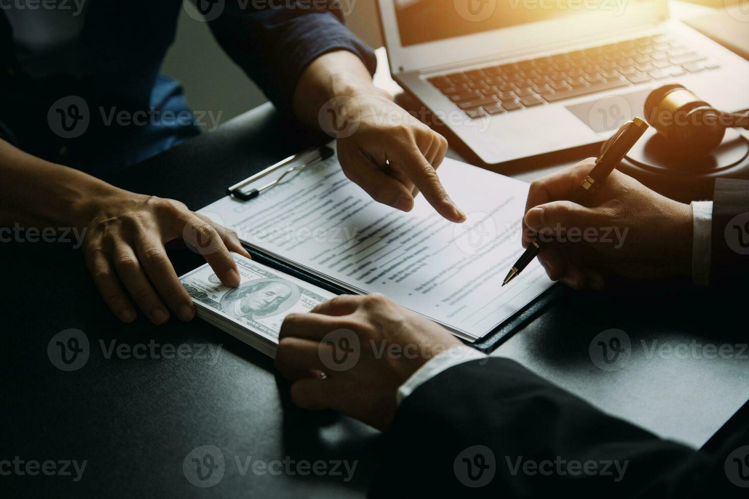 Business and lawyers discussing contract papers with brass scale on desk in office. Law, legal services, advice, justice and law concept picture with film grain effect photo