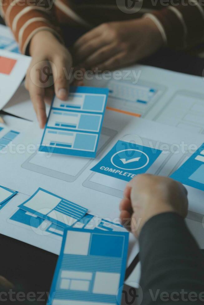 ux Graphic designer creative sketch planning application process development prototype wireframe for web mobile phone . User experience concept. photo