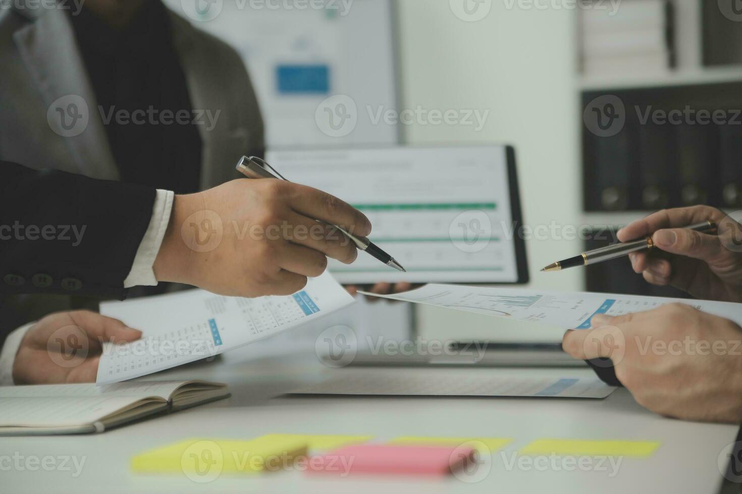 Team of business people working together in the meeting room office, teamwork background charts and graphs banner, double exposure successful teamwork,business planning concept. photo