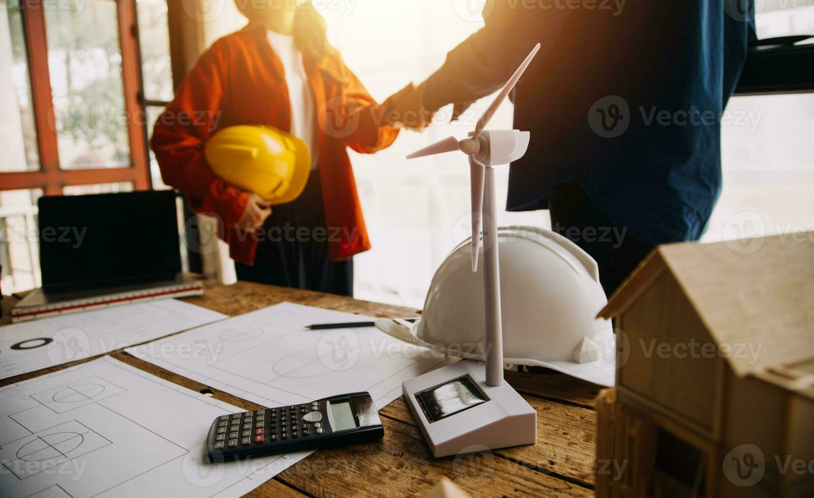 Professional Mechanical Engineer team Working on Personal Computer at Metal lathe industrial manufacturing factory. Engineer Operating lathe Machinery. Product quality Inspection photo