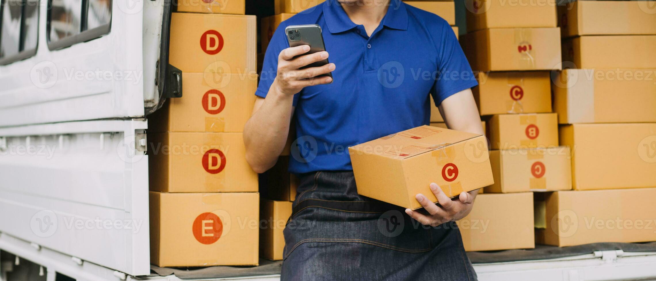 Business woman start up small business entrepreneur SME success .freelance woman working at home with Online Parcel delivery. SME and packaging deliveryconcept photo