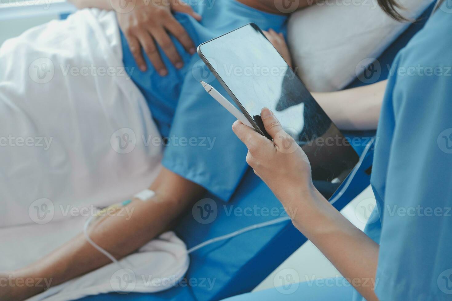 Injured patient showing doctor broken wrist and arm with bandage in hospital office or emergency room. Sprain, stress fracture or repetitive strain injury in hand. Nurse helping customer. First aid. photo