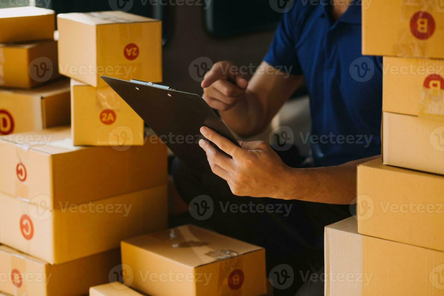 Business woman start up small business entrepreneur SME success .freelance woman working at home with Online Parcel delivery. SME and packaging deliveryconcept photo