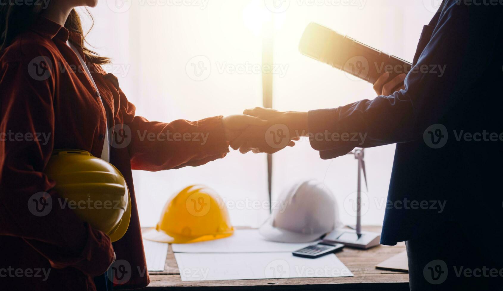 Professional Mechanical Engineer team Working on Personal Computer at Metal lathe industrial manufacturing factory. Engineer Operating lathe Machinery. Product quality Inspection photo