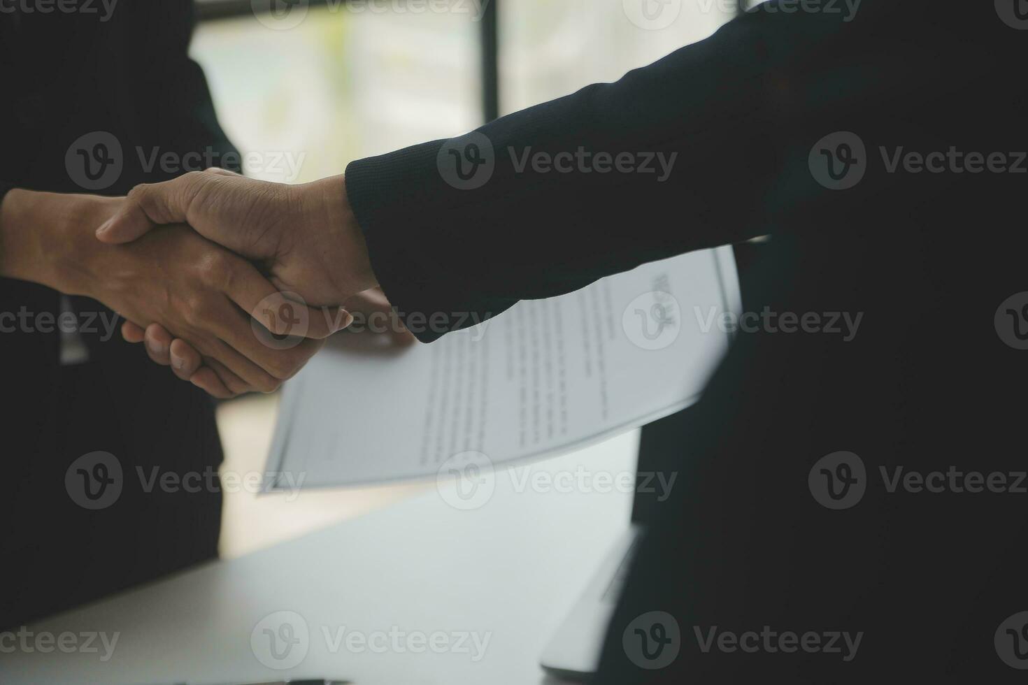 Close up view of job interview in office, focus on resume writing tips, employer reviewing good cv of prepared skilled applicant, recruiter considering application, hr manager making hiring decision photo