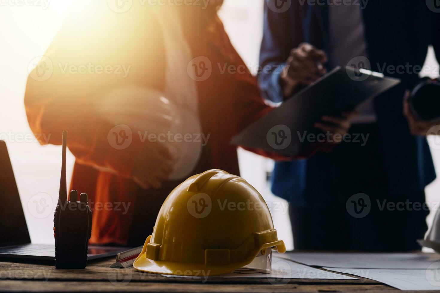 Professional Mechanical Engineer team Working on Personal Computer at Metal lathe industrial manufacturing factory. Engineer Operating lathe Machinery. Product quality Inspection photo