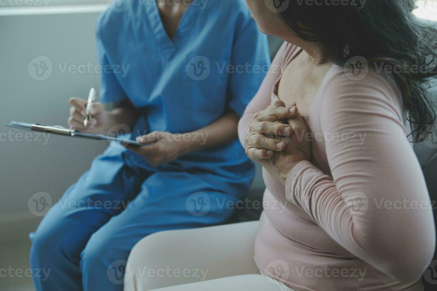 Male patient having consultation with doctor or psychiatrist who working on diagnostic examination on men's health disease or mental illness in medical clinic or hospital mental health service center photo