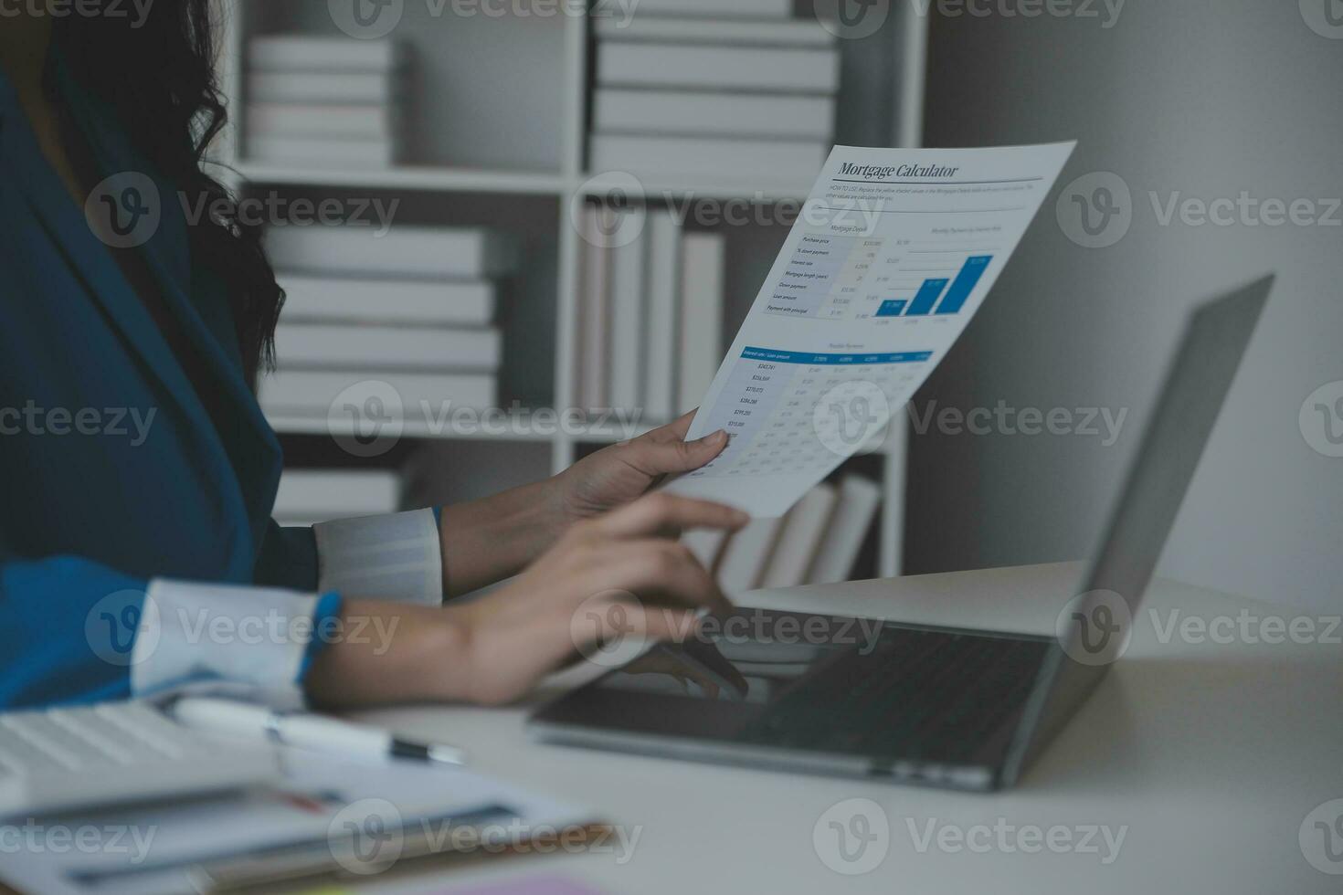 Financial analysts analyze business financial reports on a digital tablet planning investment project during a discussion at a meeting of corporate showing the results of their successful teamwork. photo