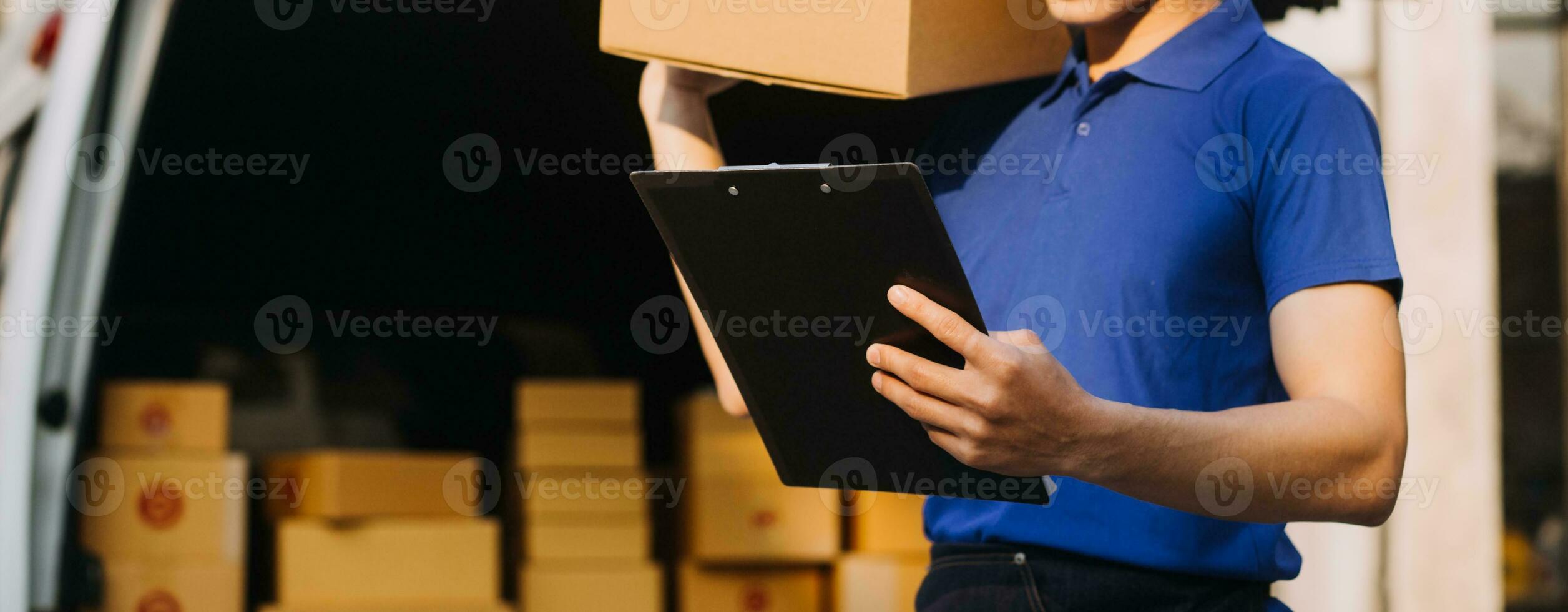 Business woman start up small business entrepreneur SME success .freelance woman working at home with Online Parcel delivery. SME and packaging deliveryconcept photo