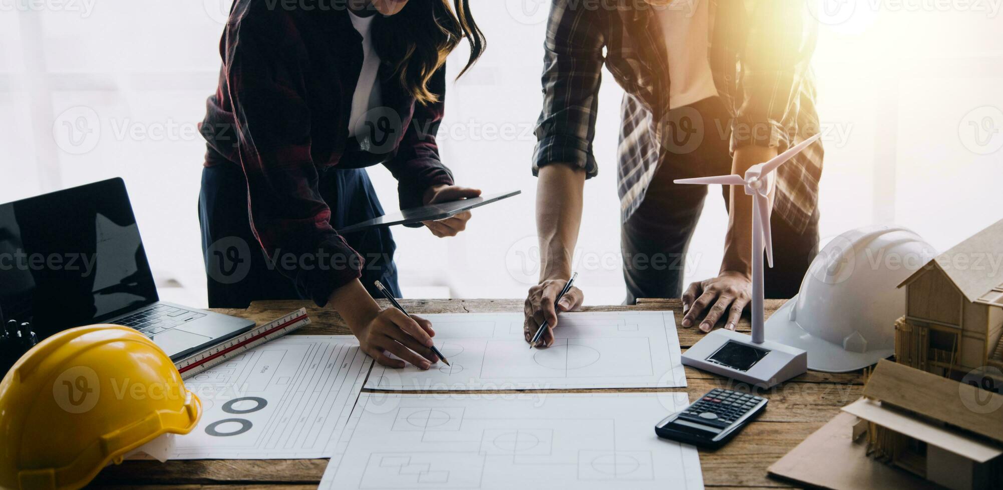 Architectural Office desk background construction project ideas concept, With drawing equipment with mining light photo