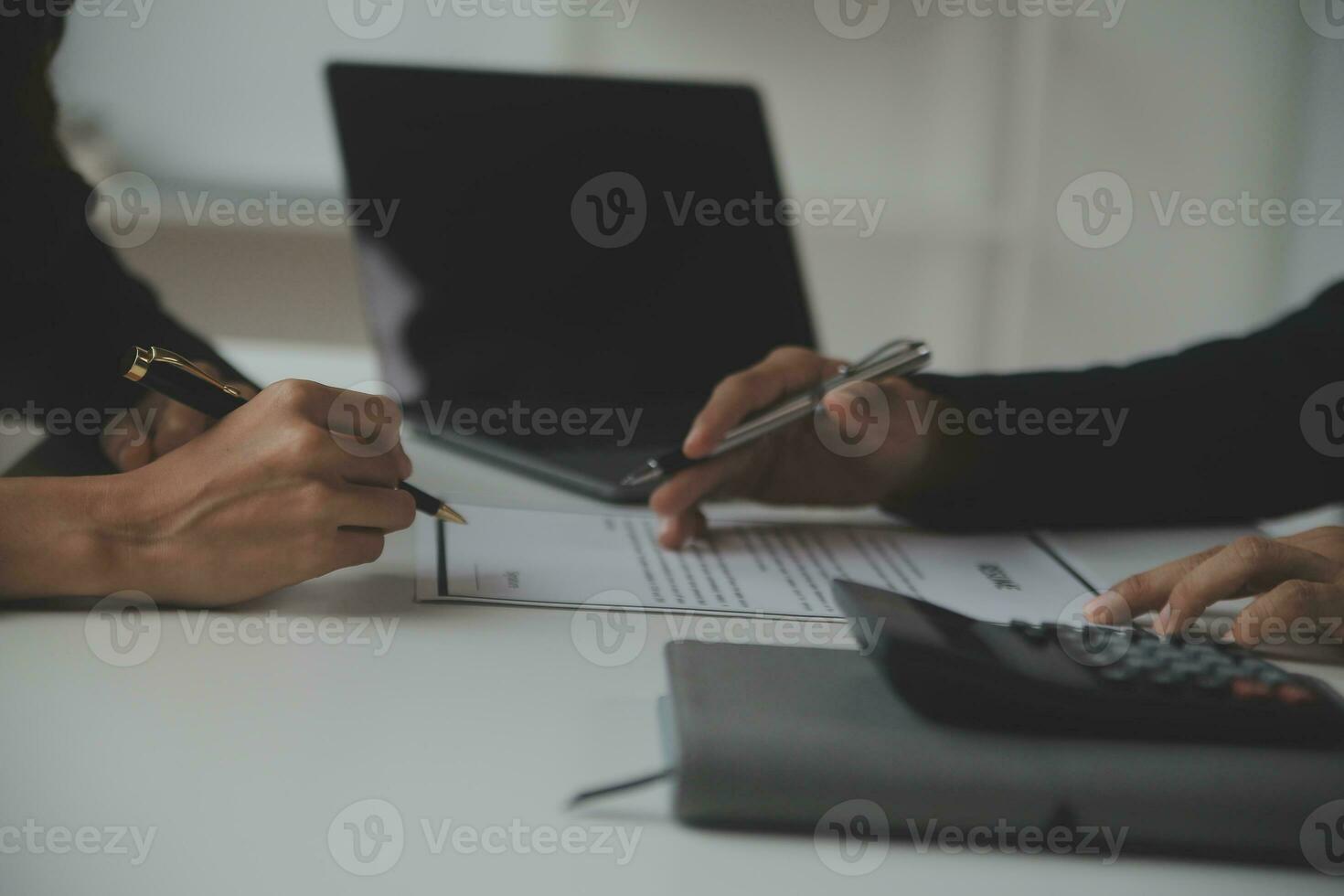 Close up view of job interview in office, focus on resume writing tips, employer reviewing good cv of prepared skilled applicant, recruiter considering application, hr manager making hiring decision photo