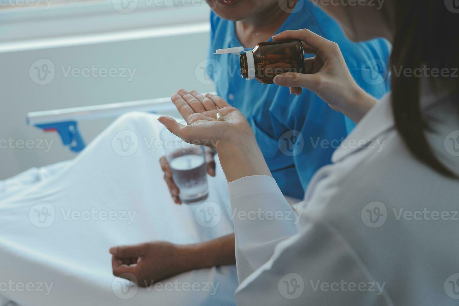 Injured patient showing doctor broken wrist and arm with bandage in hospital office or emergency room. Sprain, stress fracture or repetitive strain injury in hand. Nurse helping customer. First aid. photo