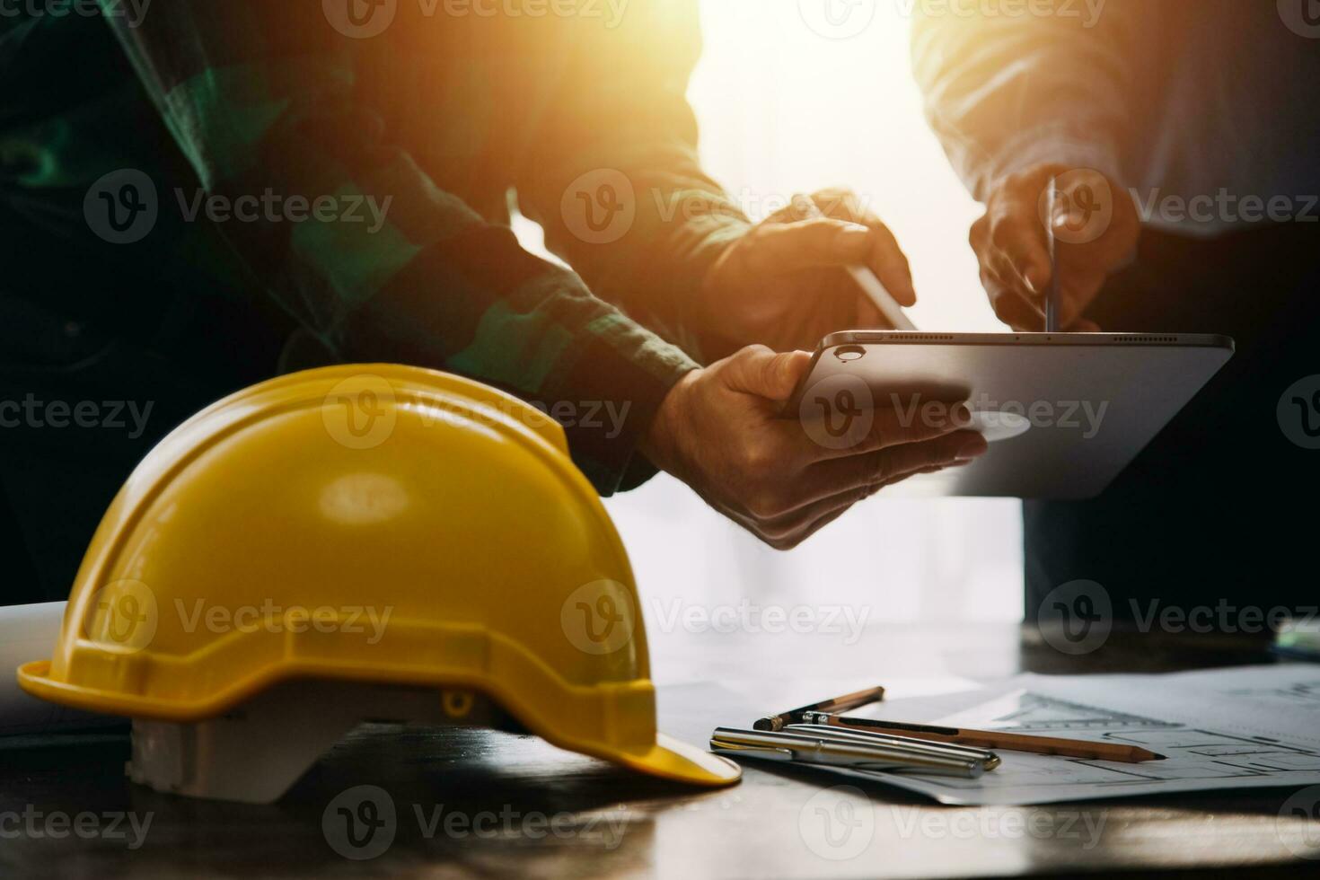 Architectural Office desk background construction project ideas concept, With drawing equipment with mining light photo