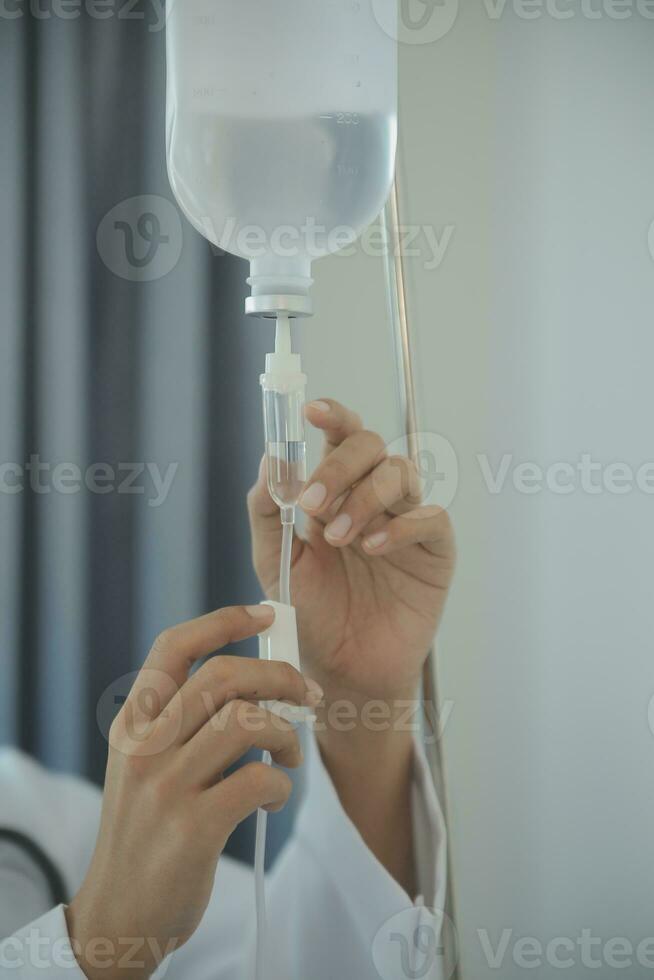 Male patient having consultation with doctor or psychiatrist who working on diagnostic examination on men's health disease or mental illness in medical clinic or hospital mental health service center photo