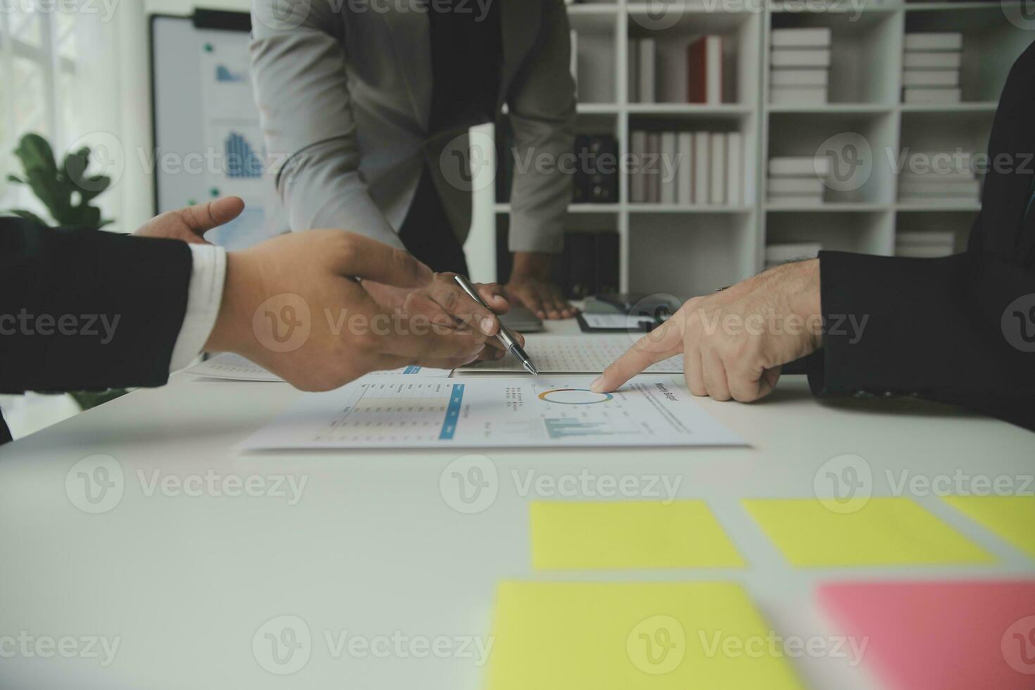 Team of business people working together in the meeting room office, teamwork background charts and graphs banner, double exposure successful teamwork,business planning concept. photo