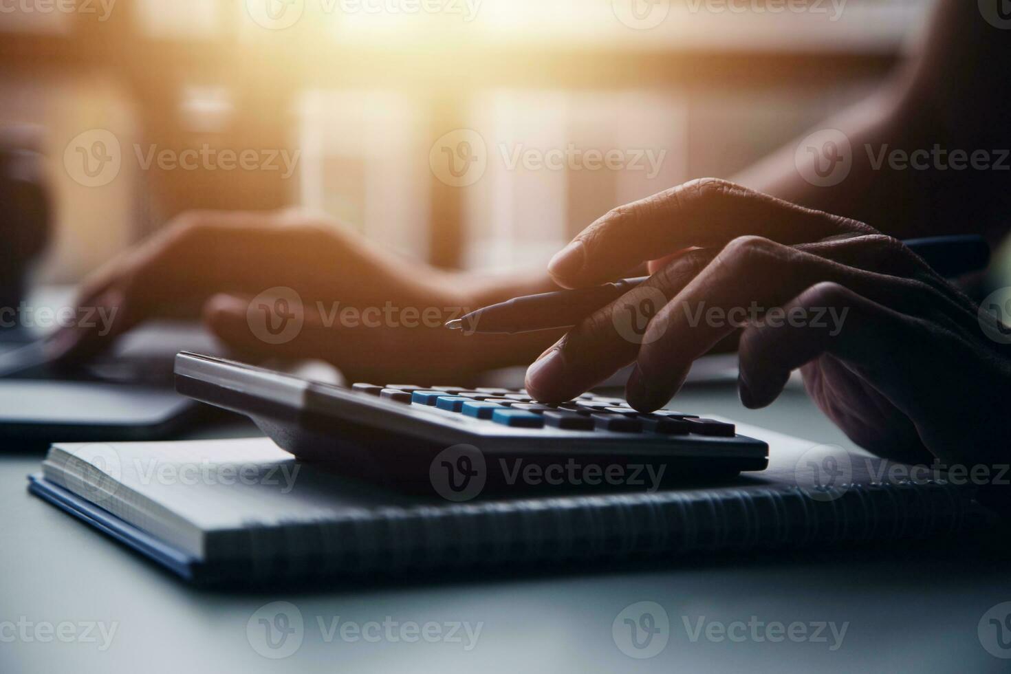 Entrepreneur Asian businessman and businesswoman discussing new business project in tablet in modern Meeting In Modern Office, Asian business casual concept. photo