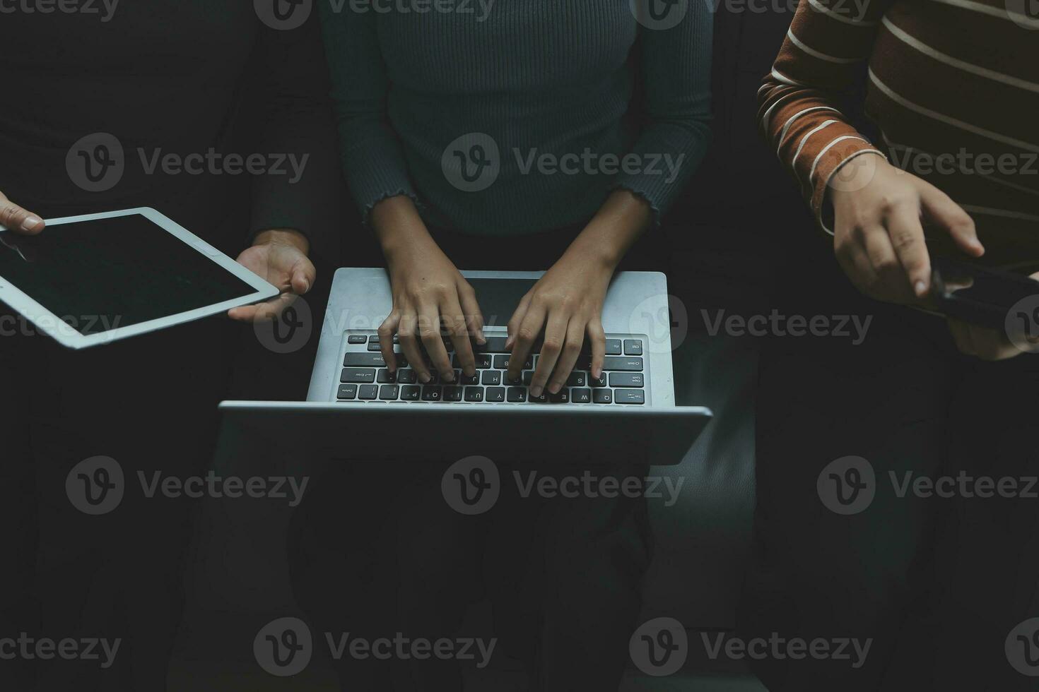 Asian Business woman using calculator and laptop for doing math finance on an office desk, tax, report, accounting, statistics, and analytical research concept photo