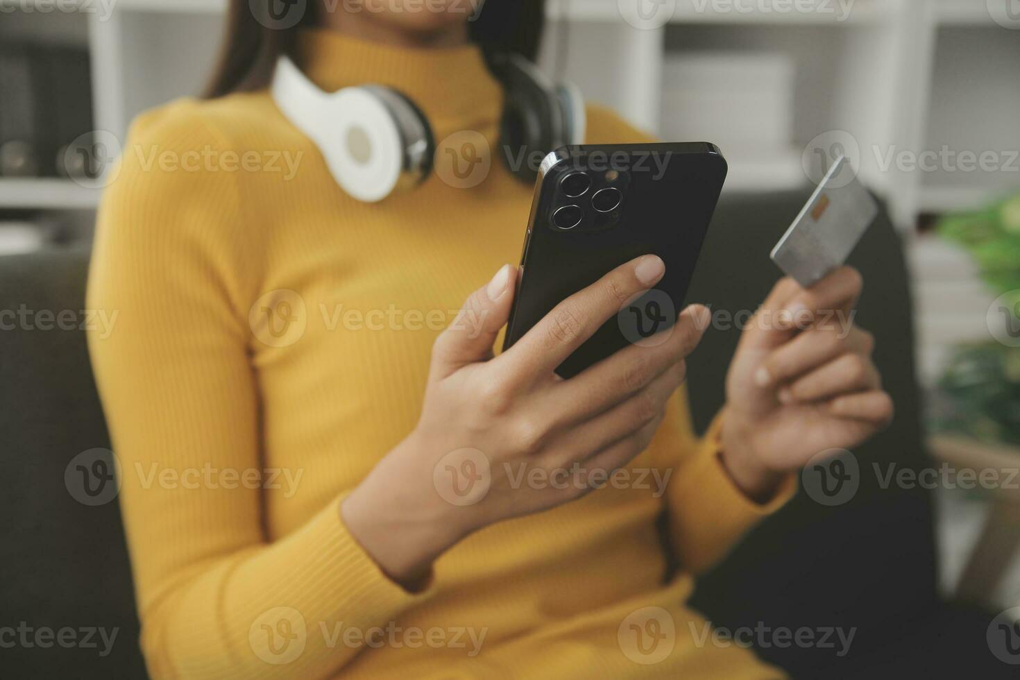 Close up of woman hand using credit card and laptop for payment and online shopping, Online shopping, payments digital banking, E-commerce concept. photo