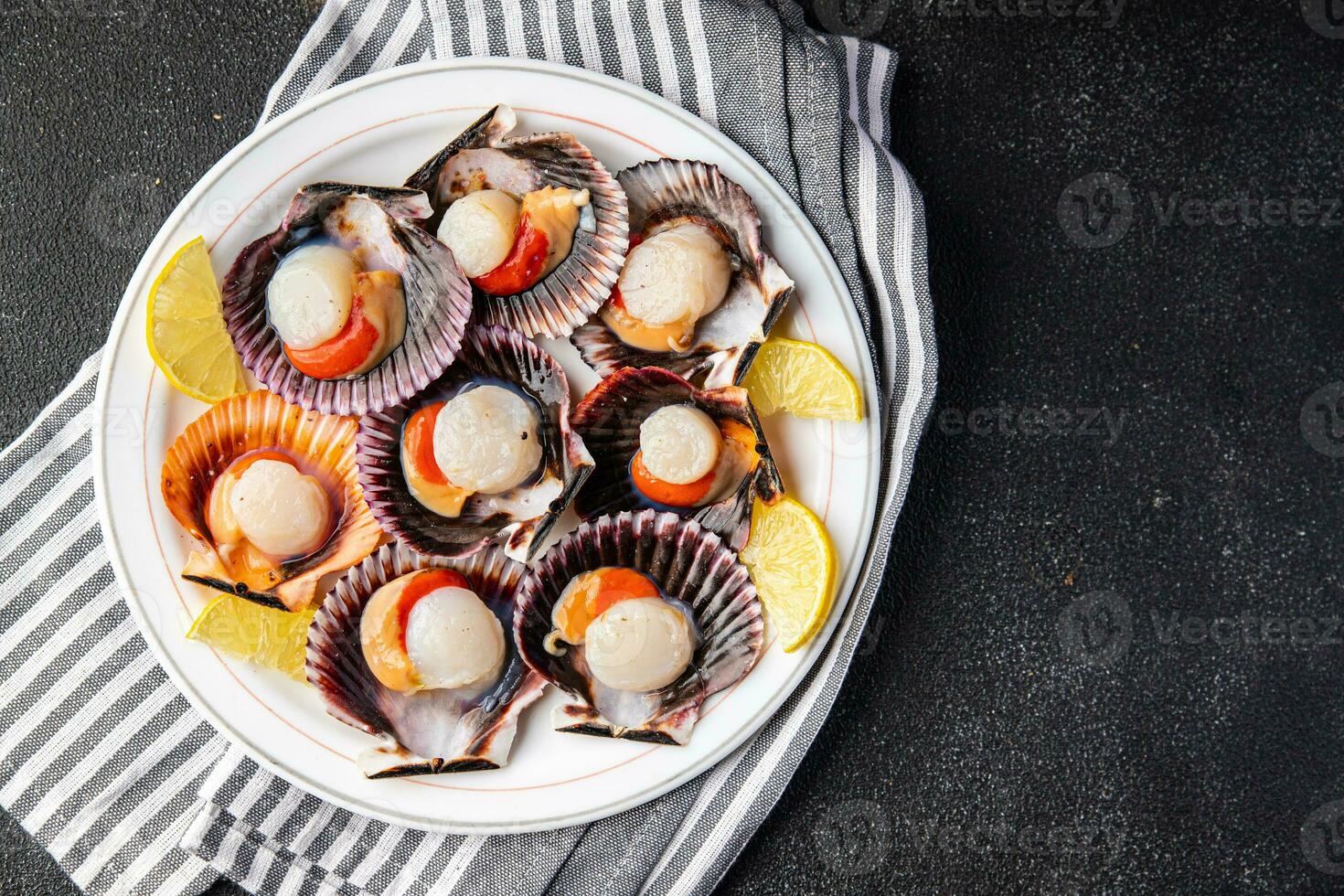 seafood scallop in shell fresh meal snack on the table copy space food background rustic top view photo