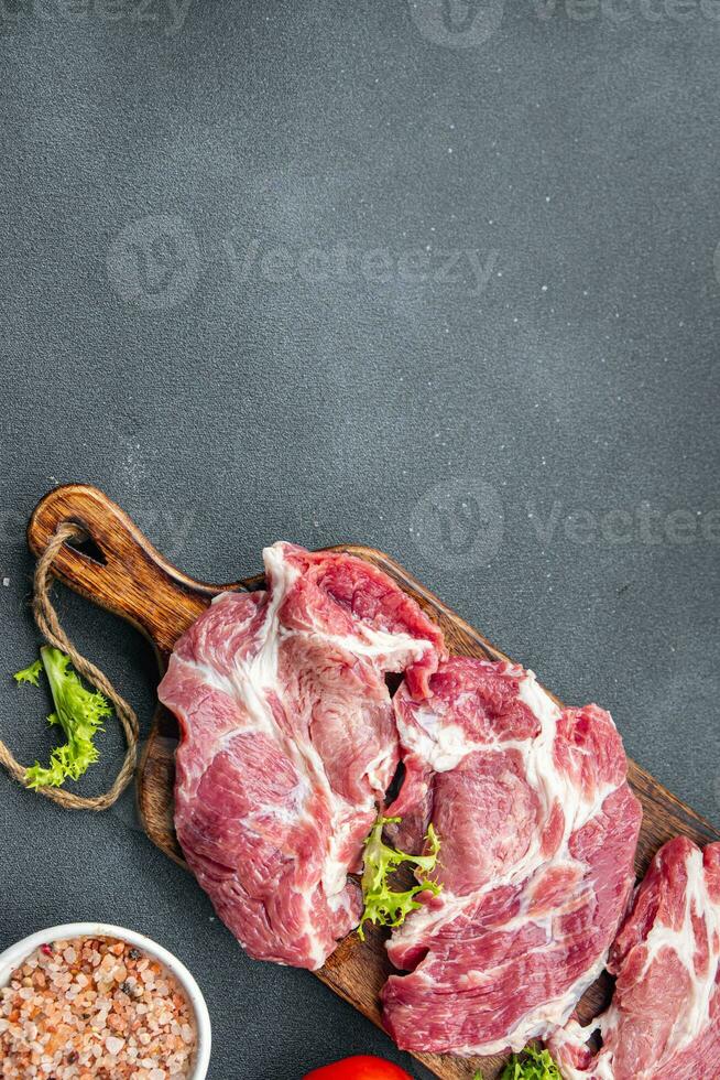 raw pork fresh meat healthy meal food snack on the table copy space food background rustic top view keto or paleo diet photo