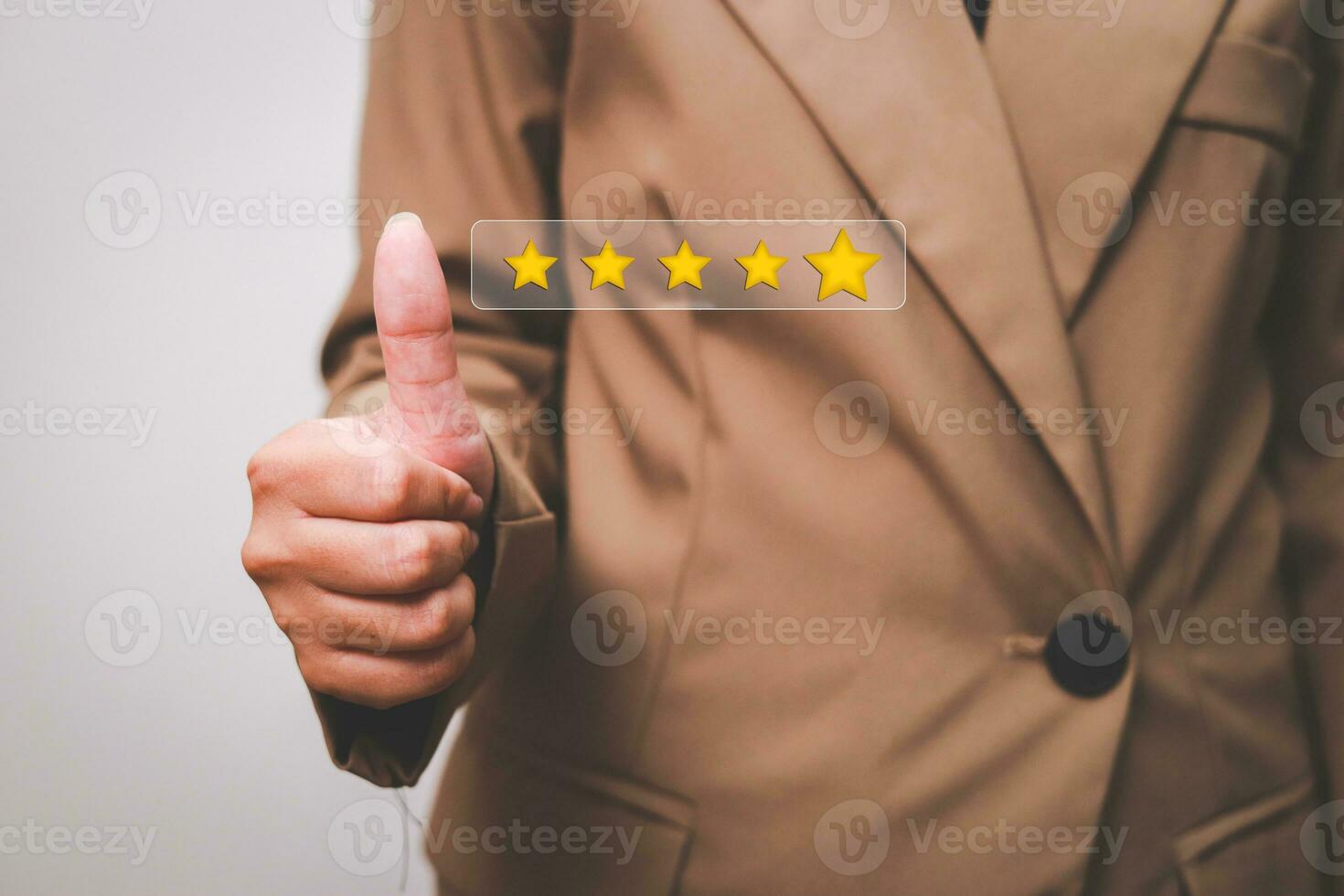 Customer pressing satisfaction with gold five star rating feedback icon and press level excellent rank for giving best score point to review the service , experience success business rate  concept. photo