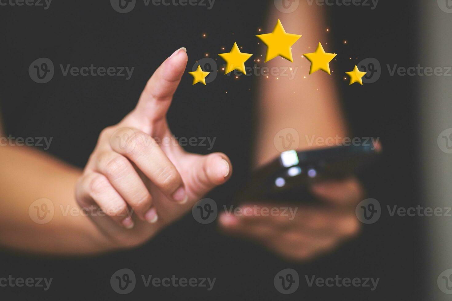 Customer pressing satisfaction with gold five star rating feedback icon and press level excellent rank for giving best score point to review the service , experience success business rate  concept. photo