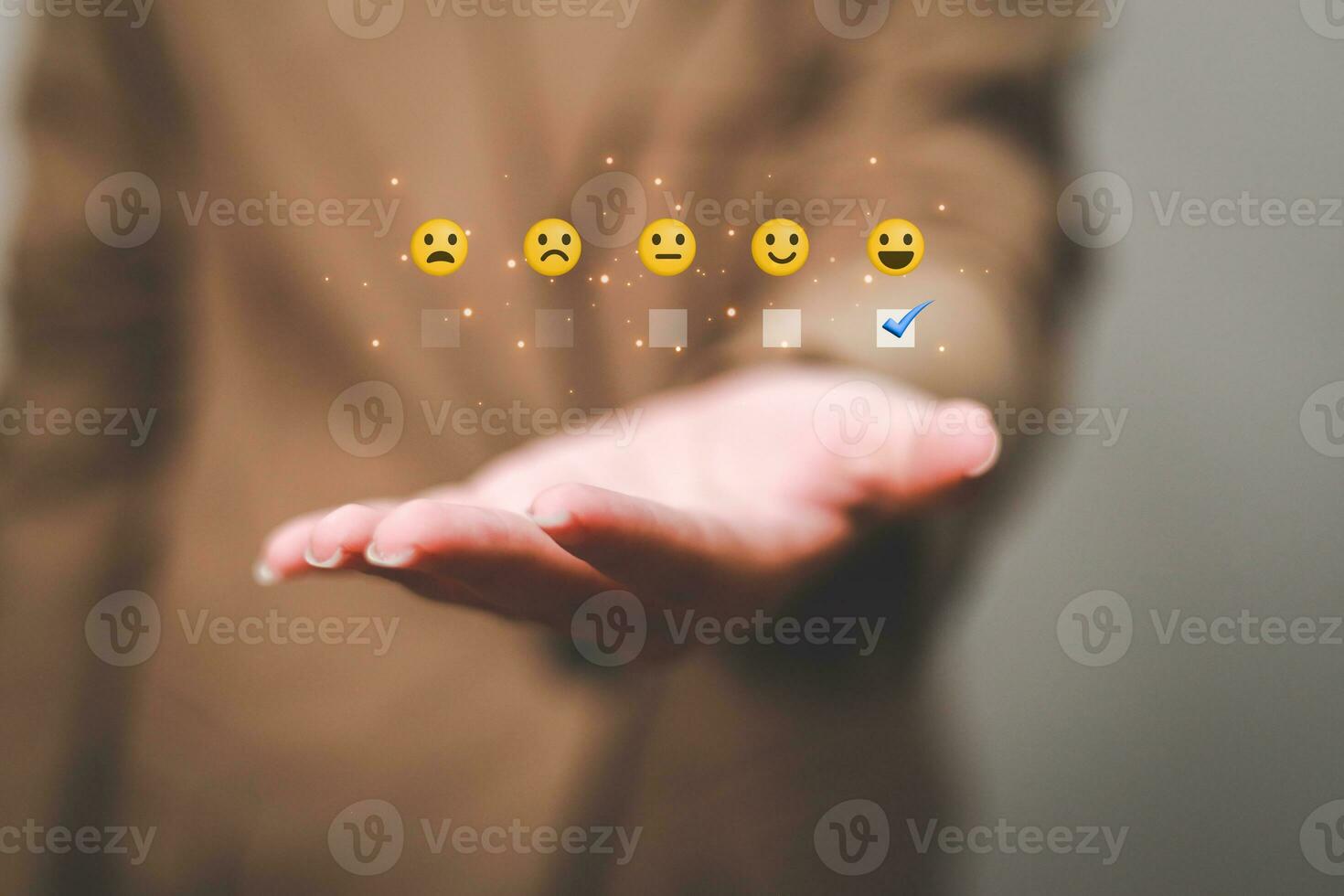 Customer pressing satisfaction with gold five star rating feedback icon and press level excellent rank for giving best score point to review the service , experience success business rate  concept. photo