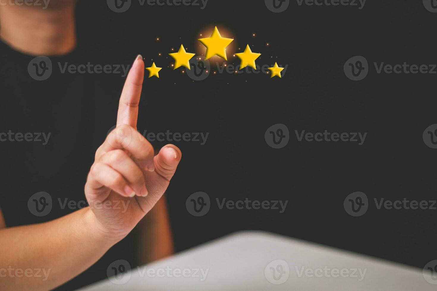 Customer pressing satisfaction with gold five star rating feedback icon and press level excellent rank for giving best score point to review the service , experience success business rate  concept. photo